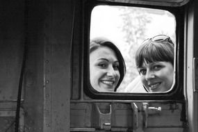black and white picture of smiling women