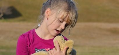 girl with a teddy bear