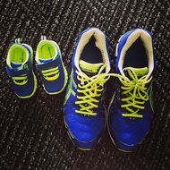 big and small blue sneakers