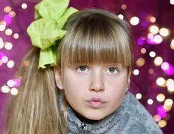 child girl face close up, bokeh background