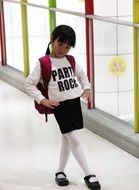 little asian girl posing indoor