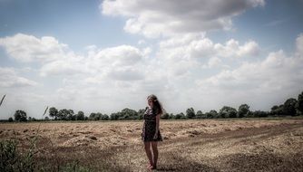 Nice photo of walking girl in the field