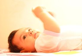happy newborn in pink