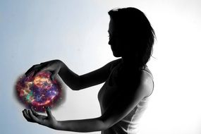 girl holding a colorful ball