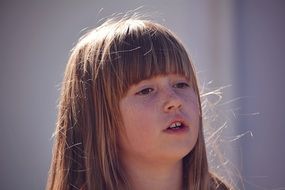 little girl in the sun