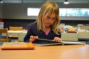 girl is reading a book