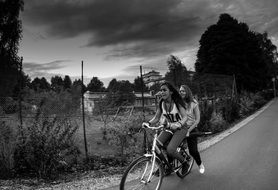 two girls on the bike