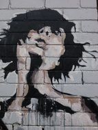 graffiti with a portrait of a young girl