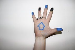 blue arrow on hand