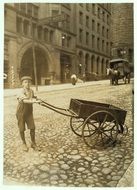 child with carriage historic card