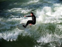 Top view of the surfer on the waves