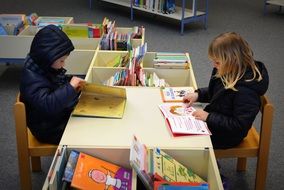 children reading in the library