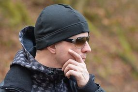 think man in hat and sunglasses
