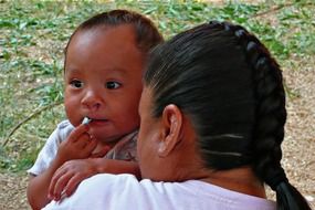 photo of mother next to her baby in Canada