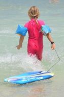 child on the waves