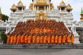 buddhist monks near the white temple