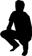 silhouette of a man squatting