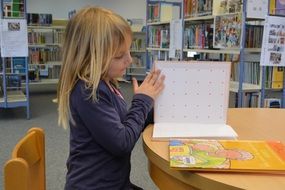 girl reading books