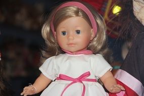 children's doll in a dress