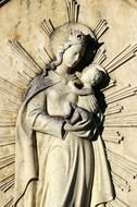 relief stone statue madonna