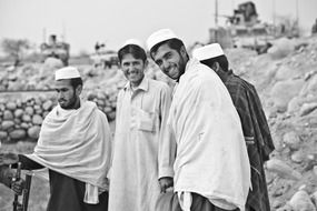 smiling afghan men
