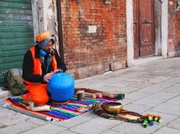 photo of a poor street musician