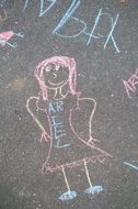 chalked girl on asphalt