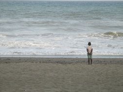 child on a sand beach