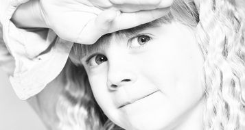 black and white photo of the girl child's face