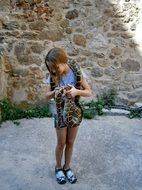 child girl with snake over shoulders