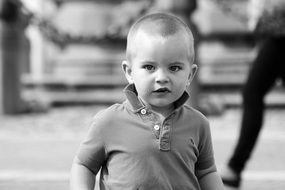surprised child in black and white background
