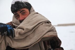 afghani man in cold winter portrait