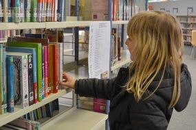 books on a shelf in the library