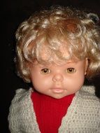 old doll with blond hair