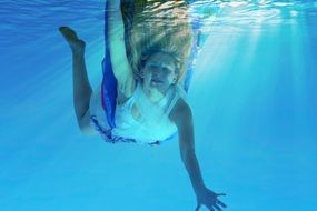 girl swim underwater