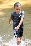 child runs on water