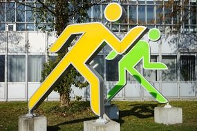 yellow green moving sculptures as a street art