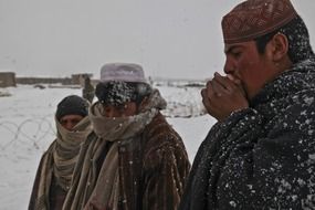 frozen afghan people in winter