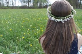 girl with wreath on the meadow