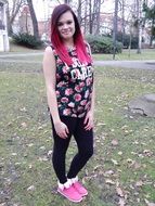 girl with pink hair in the park