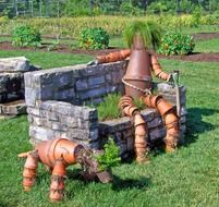 park bench, stone and iron figures