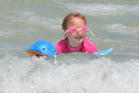 girl frolicking in the water