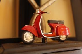 scooter for a child near the wall