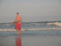 male surfer on the ocean