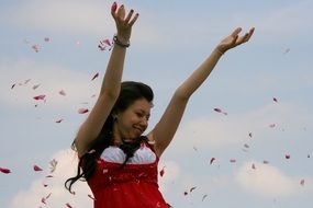 joy of girl from flying petals