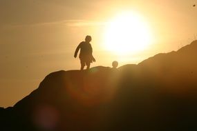 Children looking at sunset