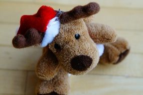 soft toy moose with christmas hat