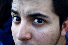 portrait of a man with brown eyes