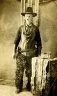 snake hunter, vintage portrait of young man with skins