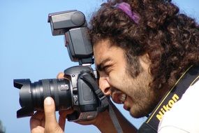 photographer with a camera close up